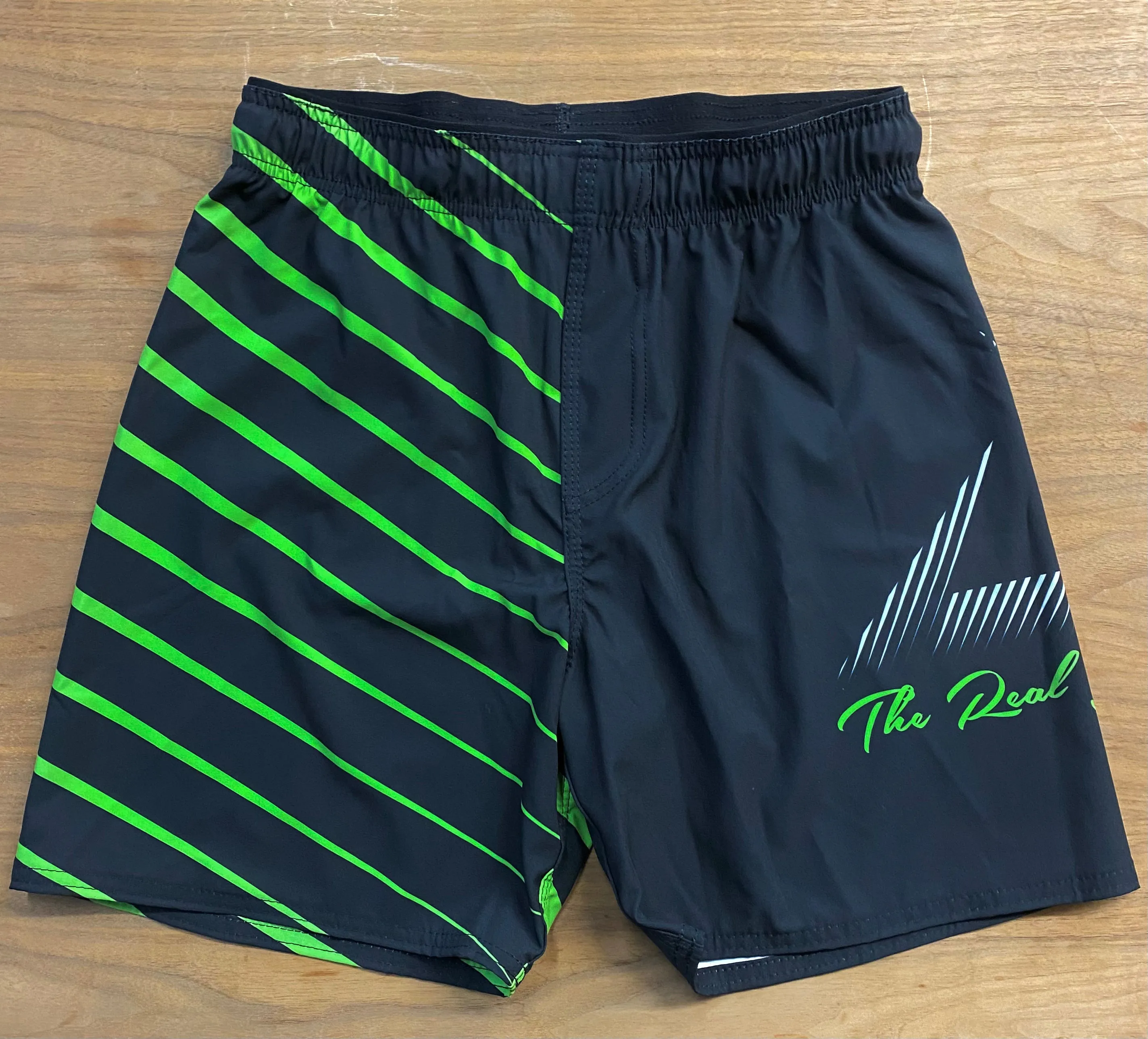 MMA SPEAR FIGHT SHORTS BLACK & GREEN